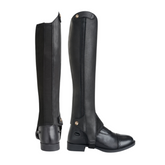 Pair of black riding boots on a white background